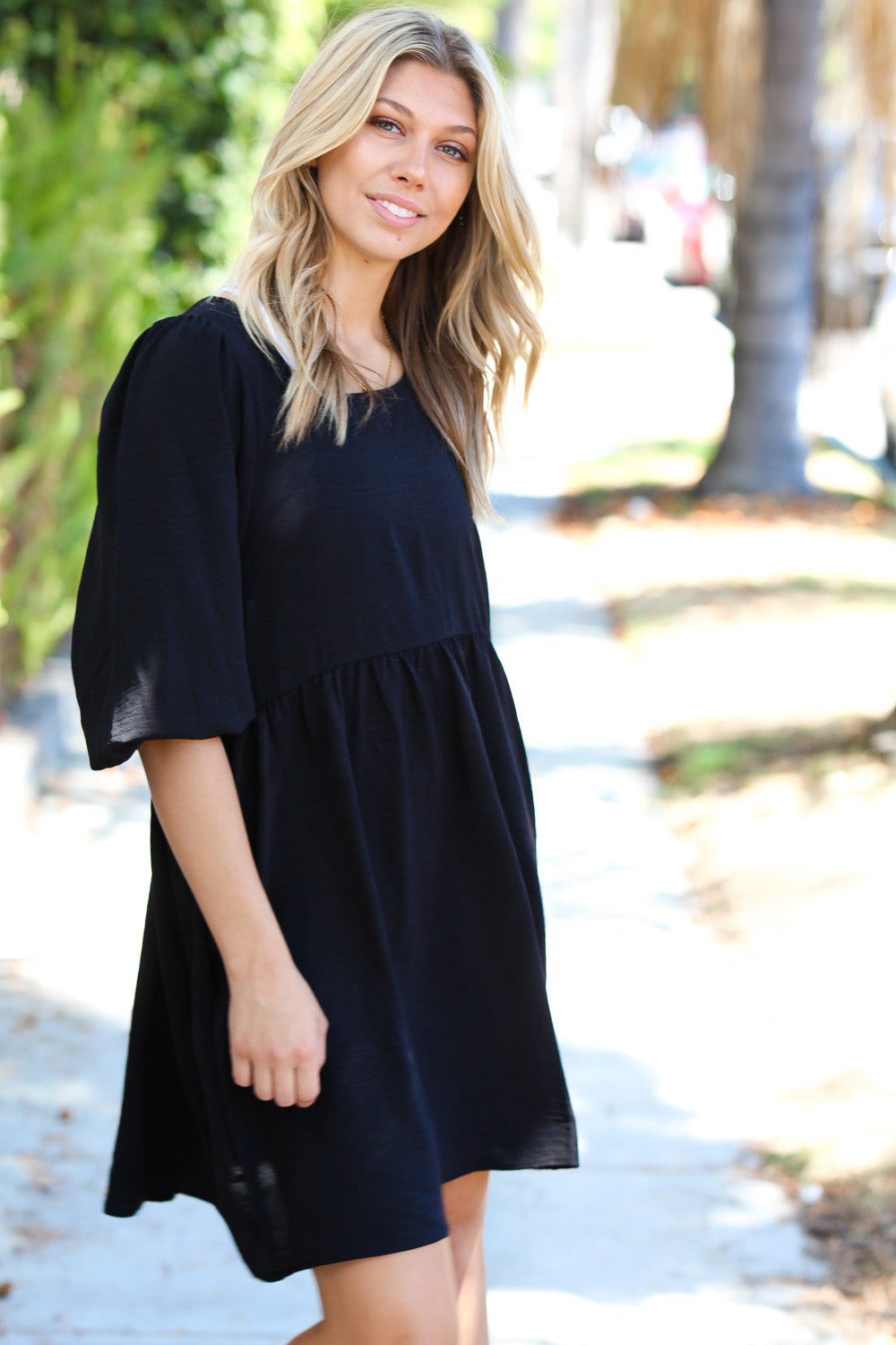 Can’t Tame Her Three Quarter Puff Sleeve Babydoll Dress • Black