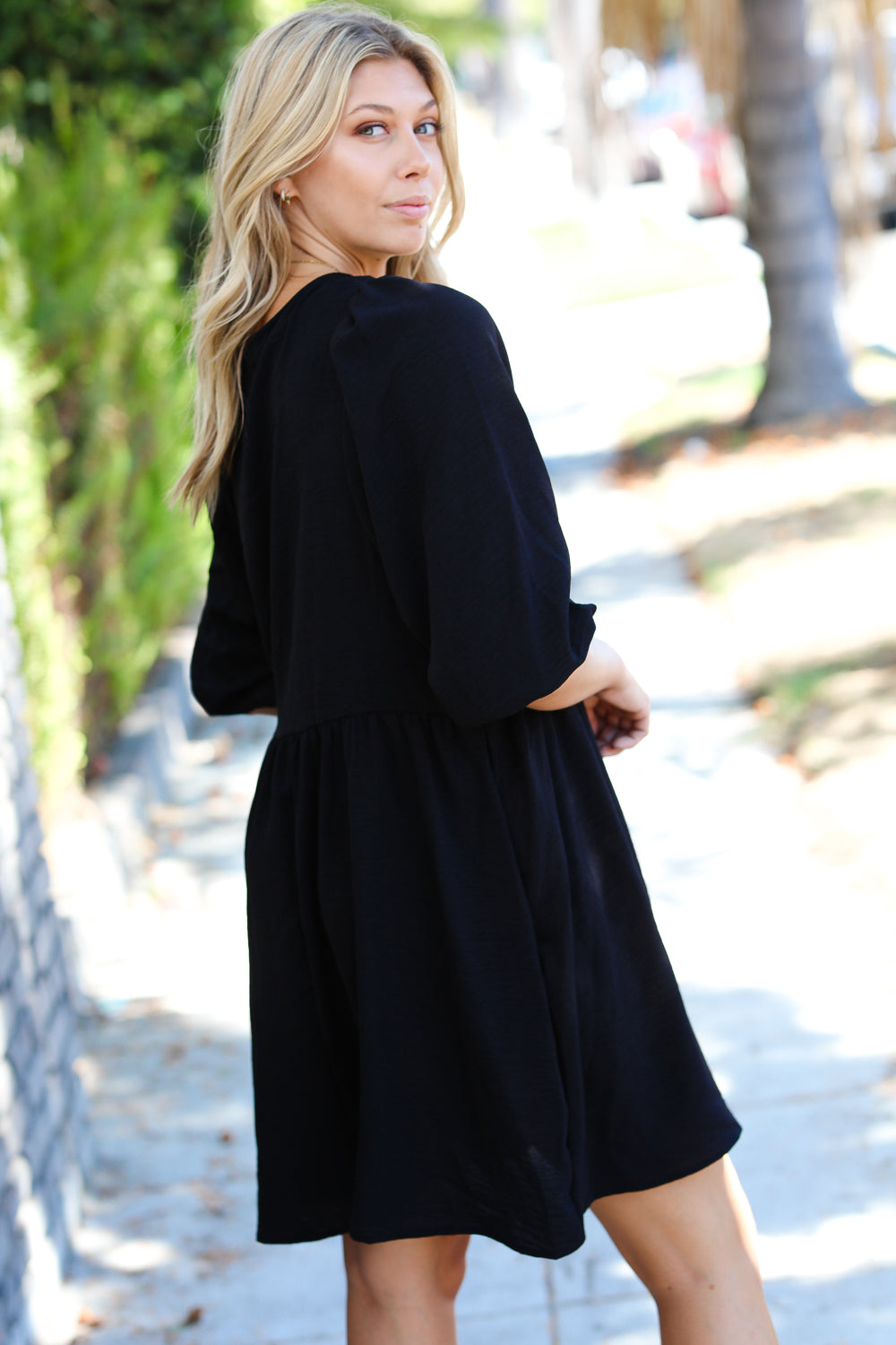 Can’t Tame Her Three Quarter Puff Sleeve Babydoll Dress • Black