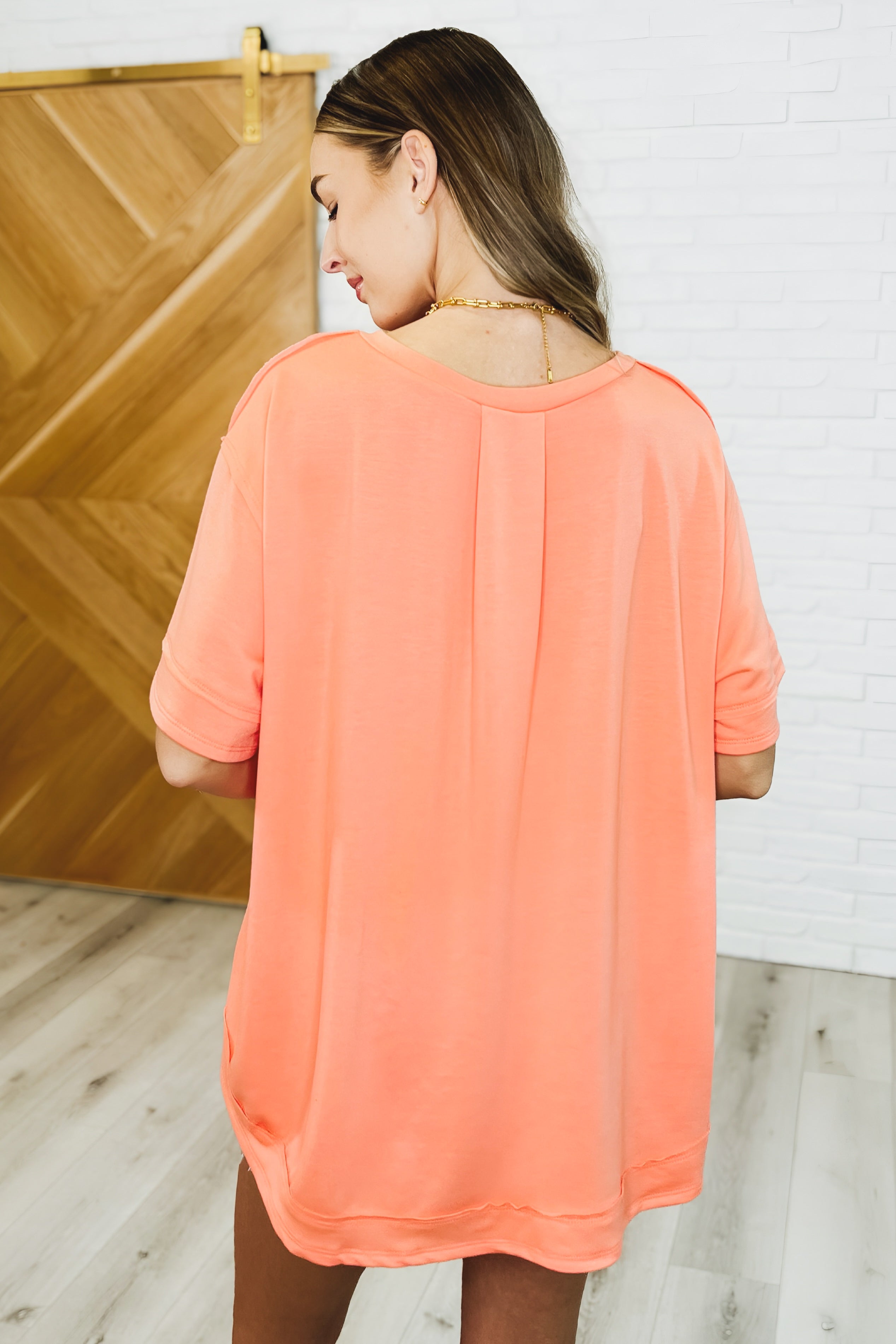 In the Rotation Exposed Seam Tee • Apricot Splash