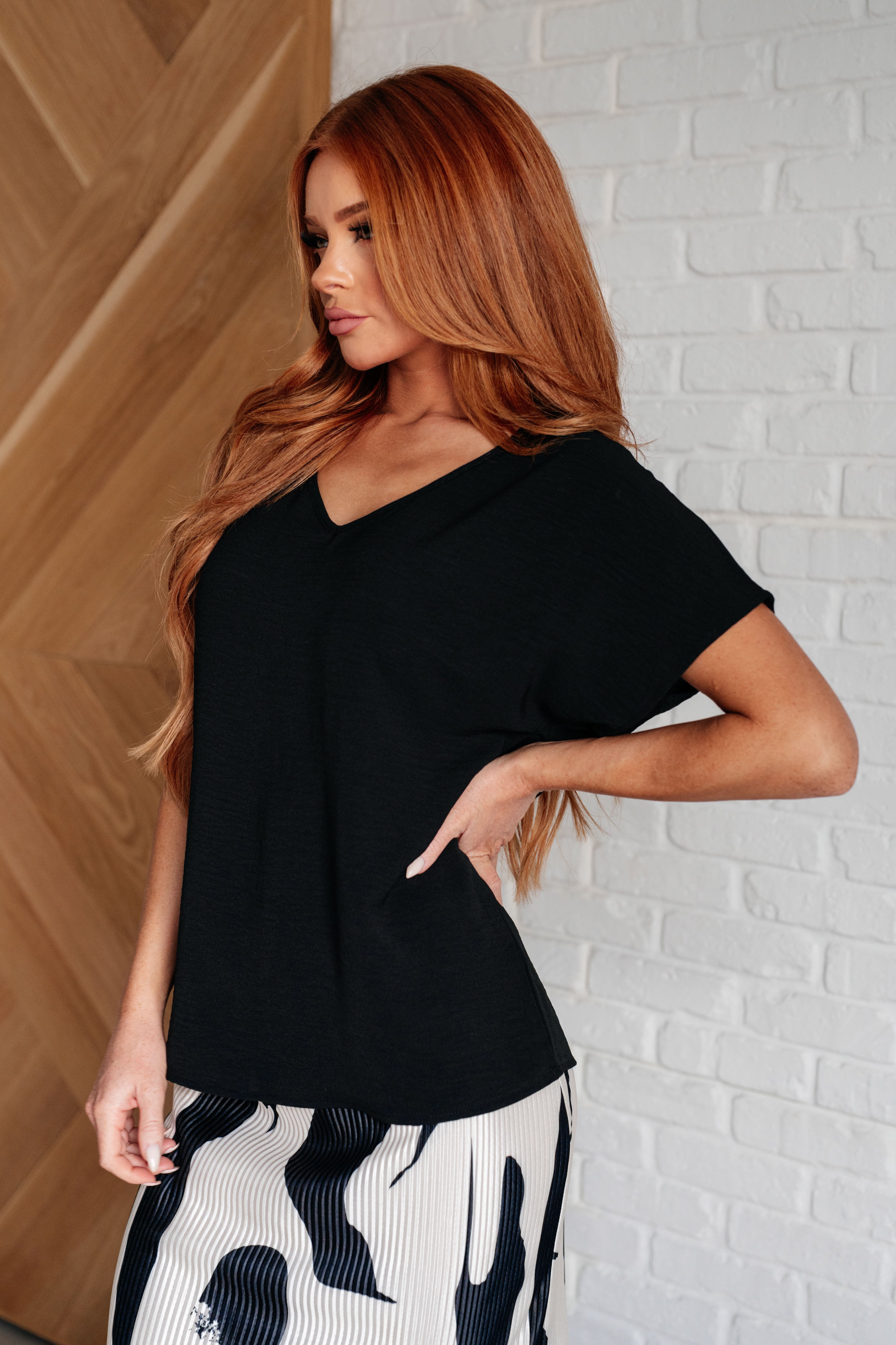 Frequently Asked Questions V-Neck Top • Black