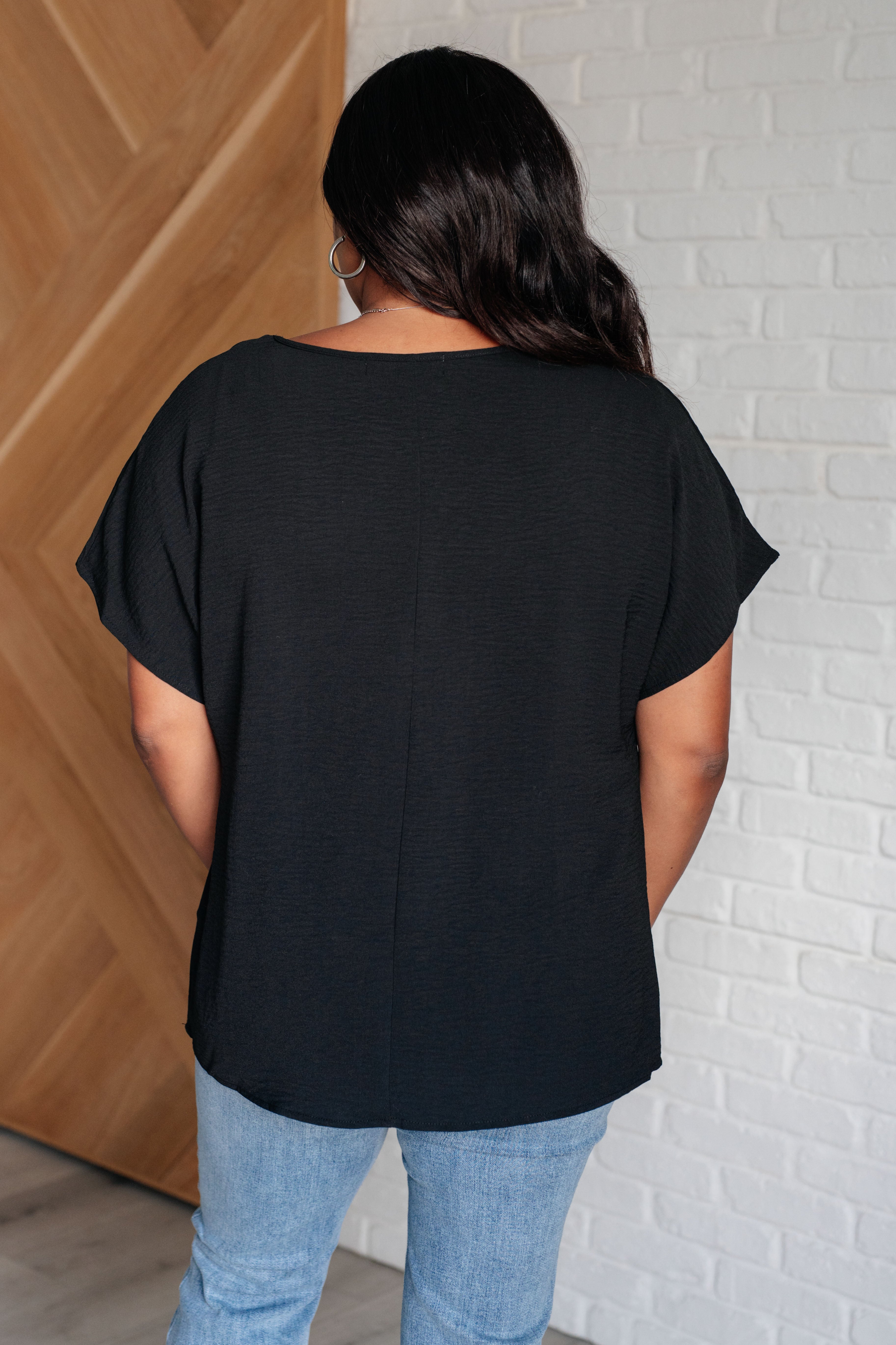 Frequently Asked Questions V-Neck Top • Black