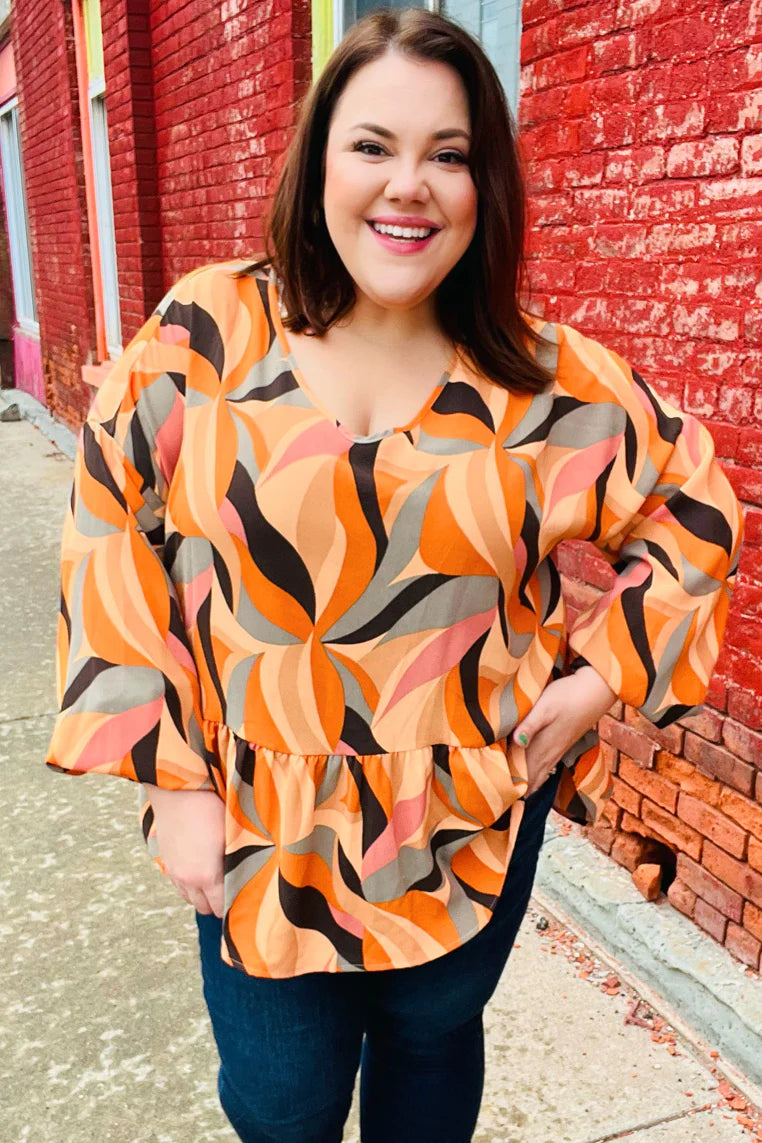 In My Thoughts Abstract V Neck Peplum Top