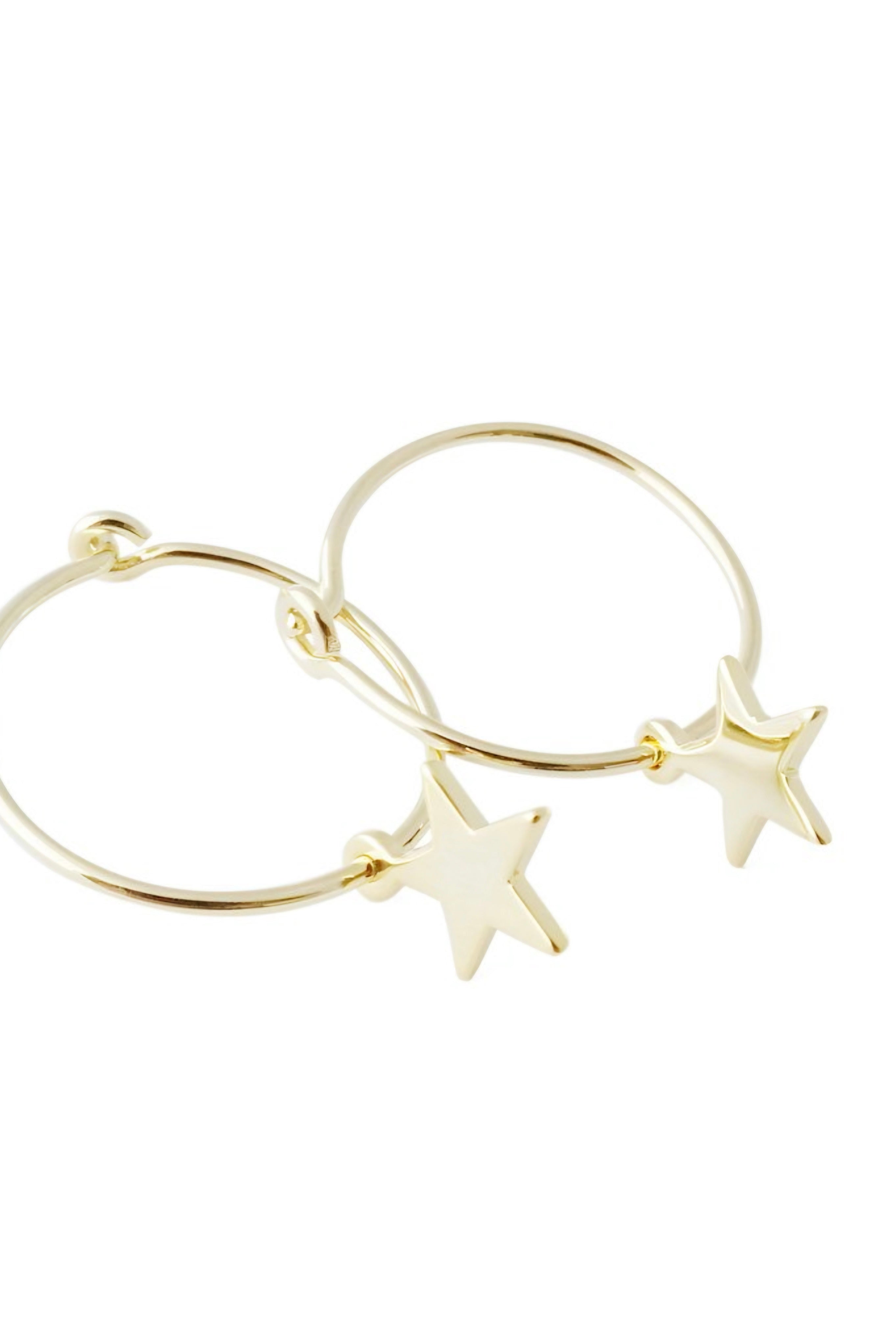 Close-up of gold hoop earrings with smooth star charms on white background, AstraMagicCharmStarHoopEarrings11.jpg image.