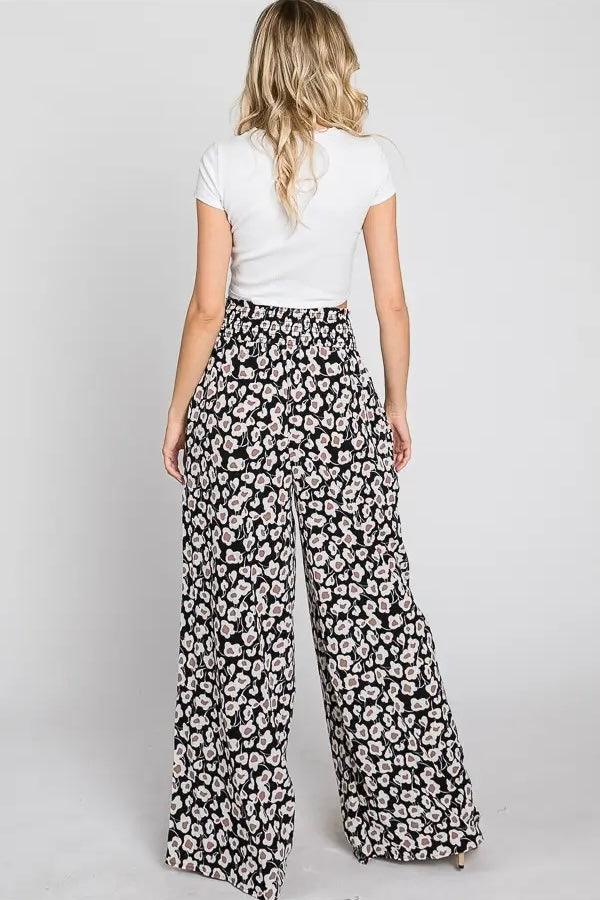 Flowers In Your Hair Retro Vintage Print Smocked Pants black ivory floral pattern shown from back on model
