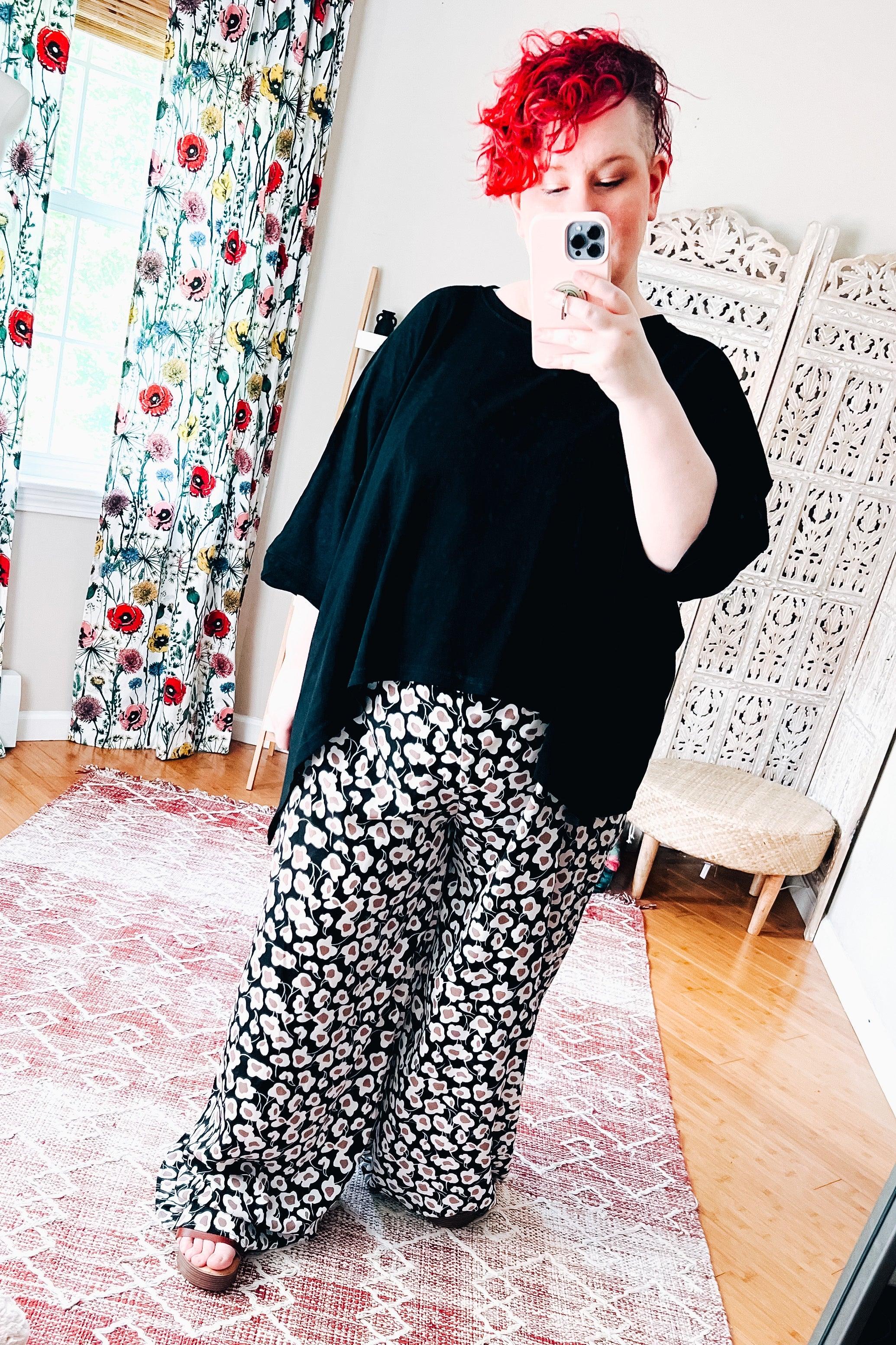 Flowers In Your Hair Retro Vintage Print Smocked Pants in black and ivory paired with loose black top indoors