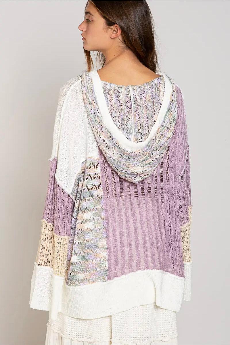 Open-knit lavender and cream lightweight cardigan with patchwork design and a relaxed hooded back view