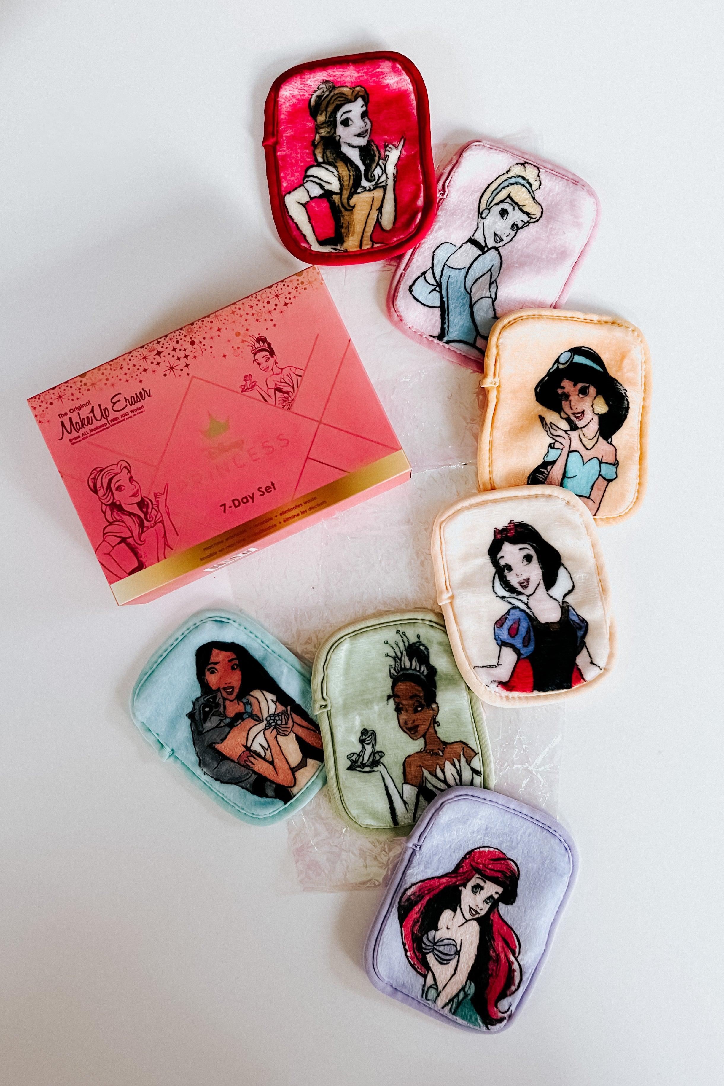 Multicolor plush makeup remover cloths featuring Disney princess designs with pink packaging on white surface