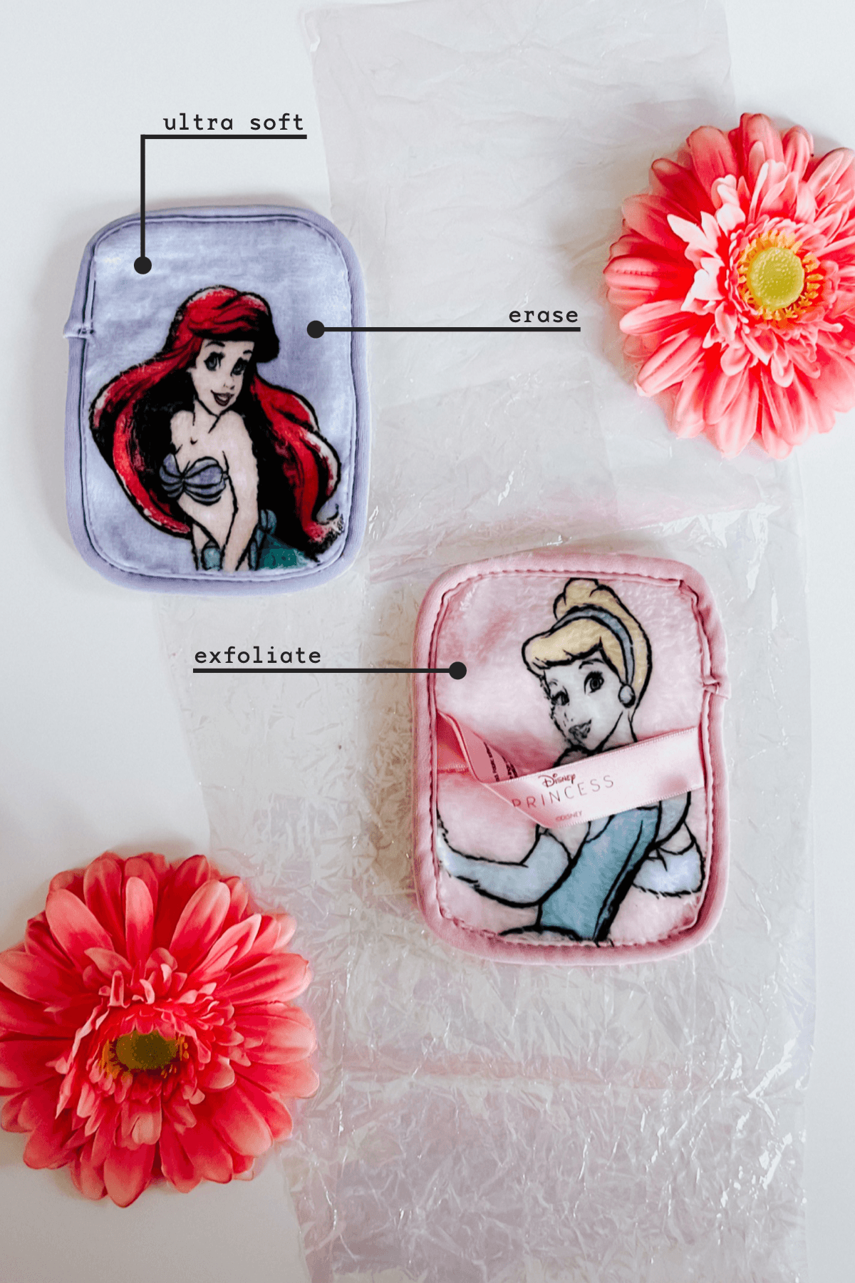 Two plush makeup remover cloths featuring Disney princesses Ariel and Cinderella with pink flowers on white background