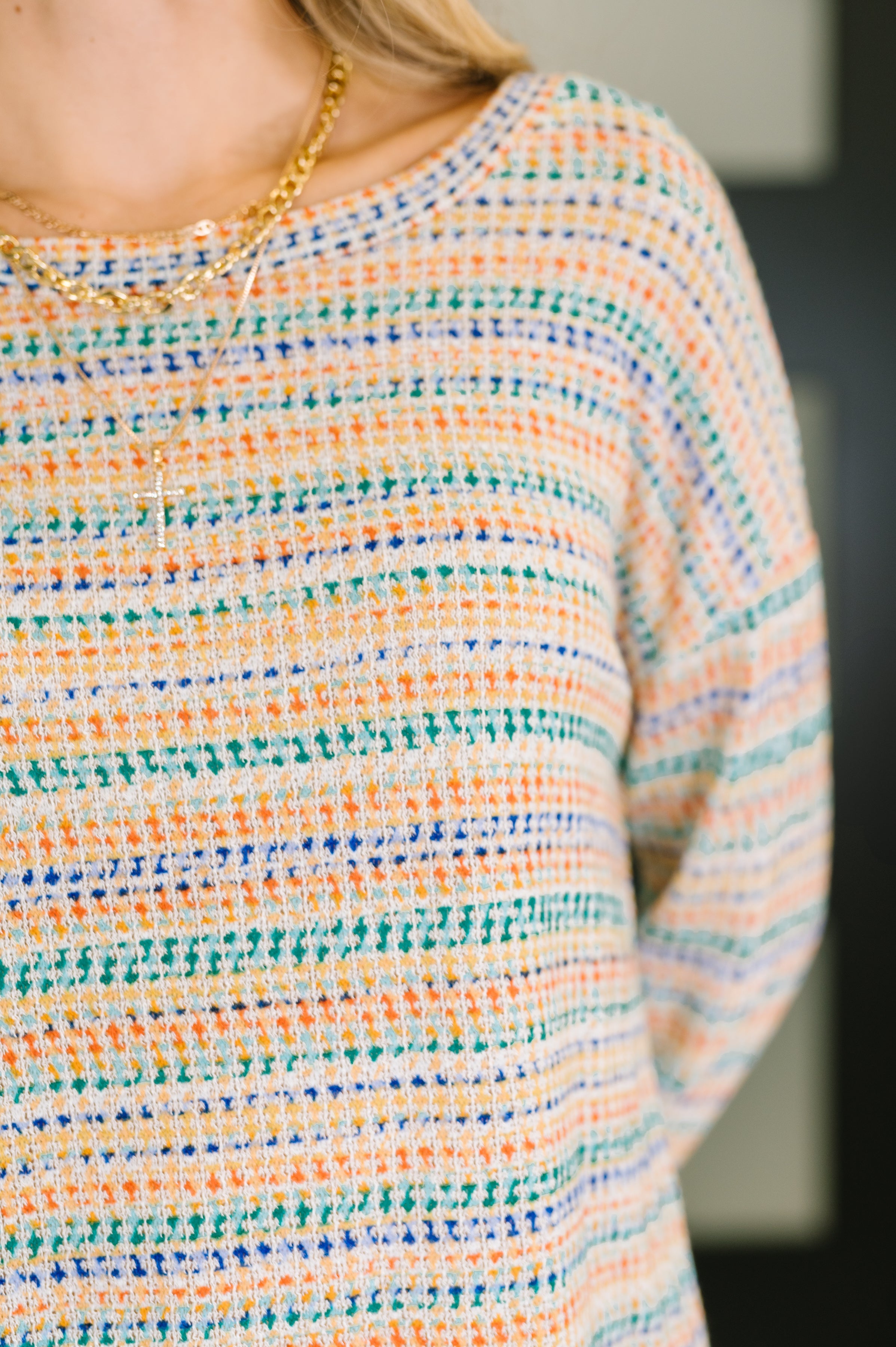 Close-up of multi Just About Right Top with textured knit pattern featuring horizontal stripes in green, blue, and orange hues